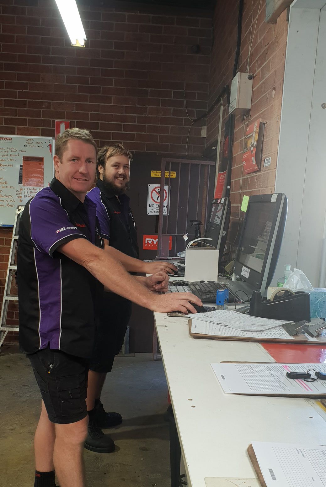 Auto Mechanics In Front Of Computers — Servicing And Repairs in Lambton, NSW