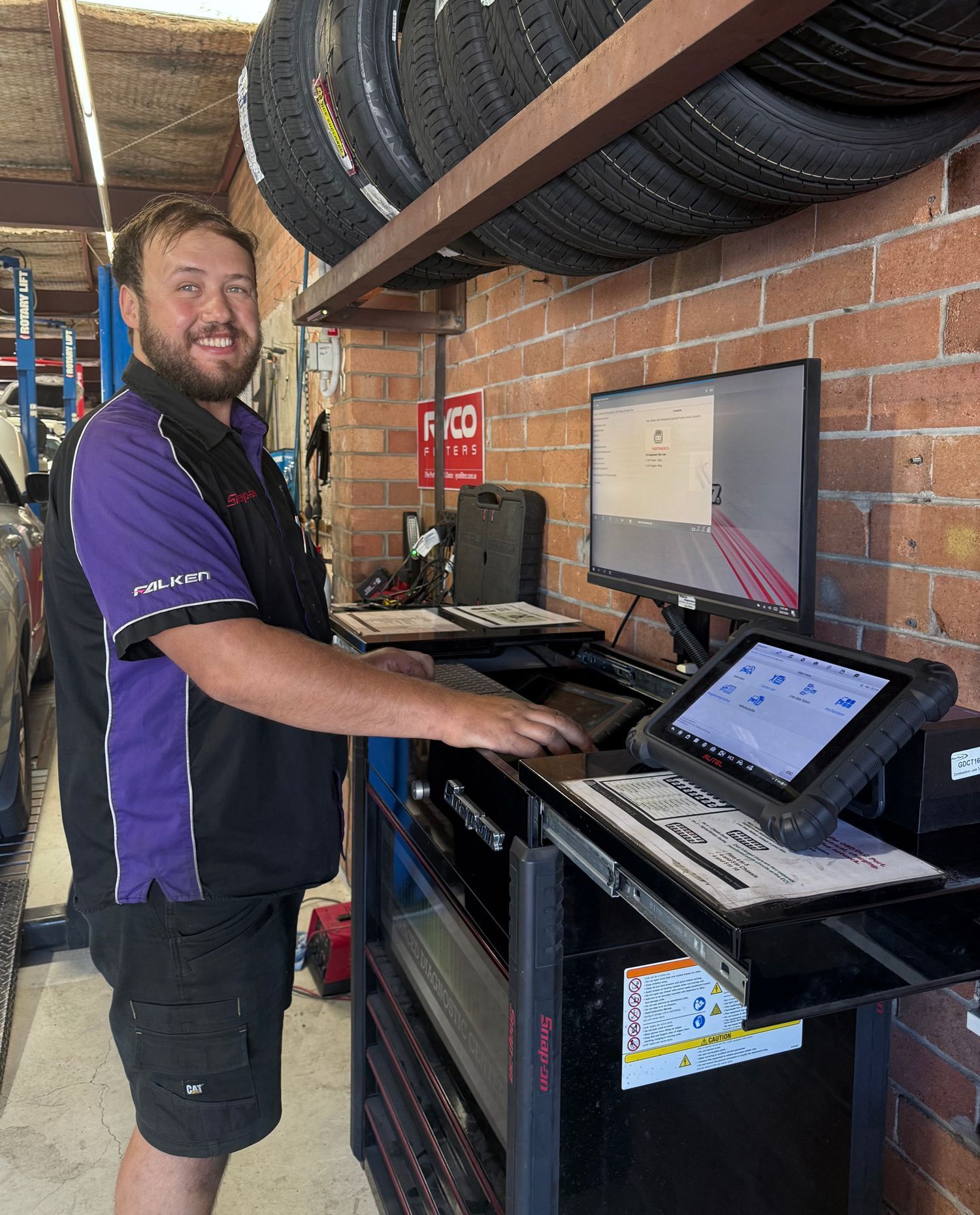 Mechanic In Newcastle Using A Diagnostic Tool