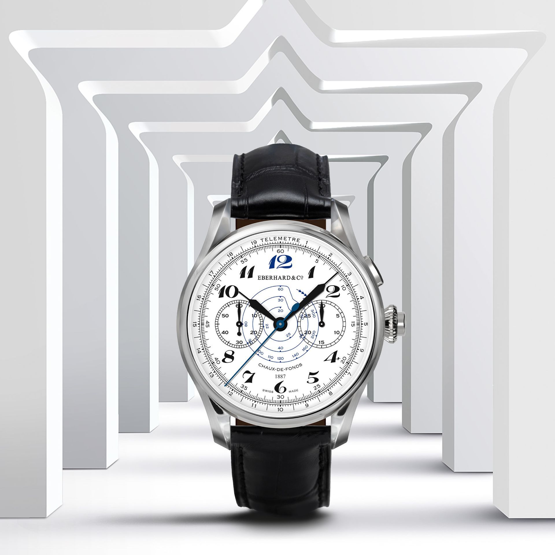 Un orologio argento e nero con cinturino in pelle nera