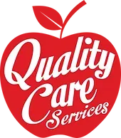 A red apple with the words `` quality care services '' written on it.