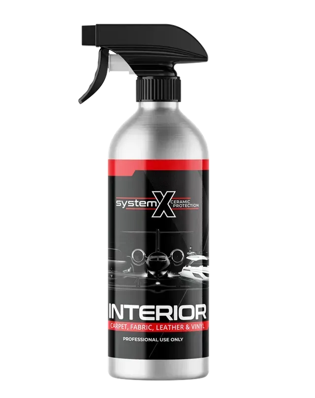 Black spray bottle labeled “Interior” with a black trigger nozzle and red accent band