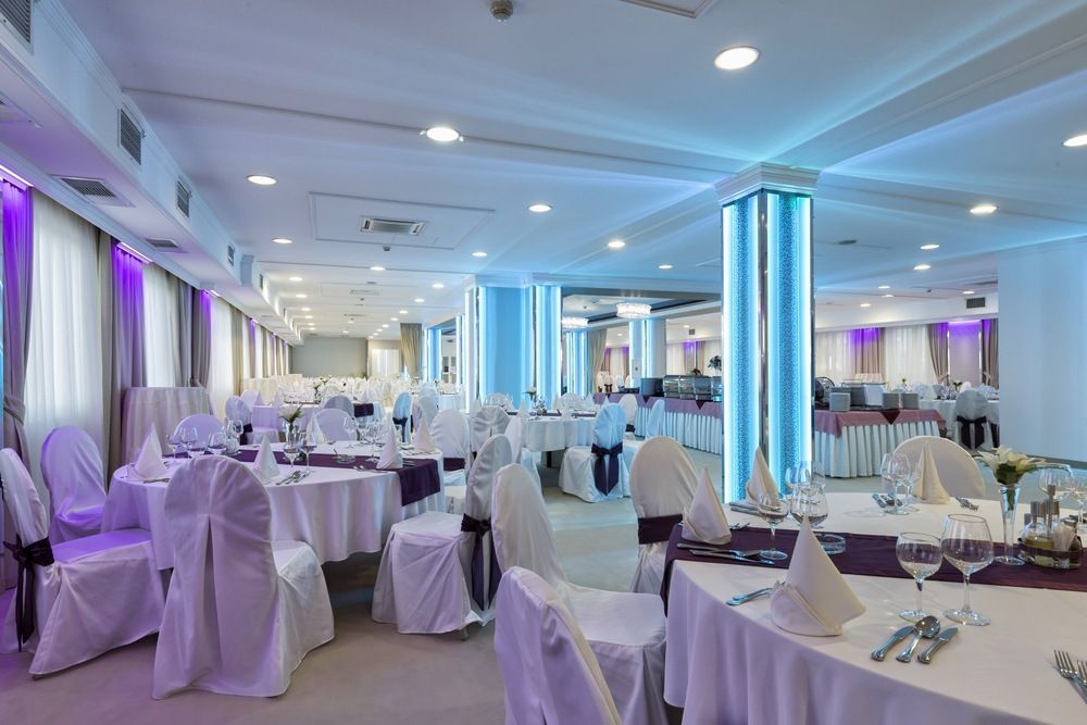 A Large Room With Tables and Chairs Set Up for a Wedding Reception — Tuncurry Washerteria In Tuncurry, NSW