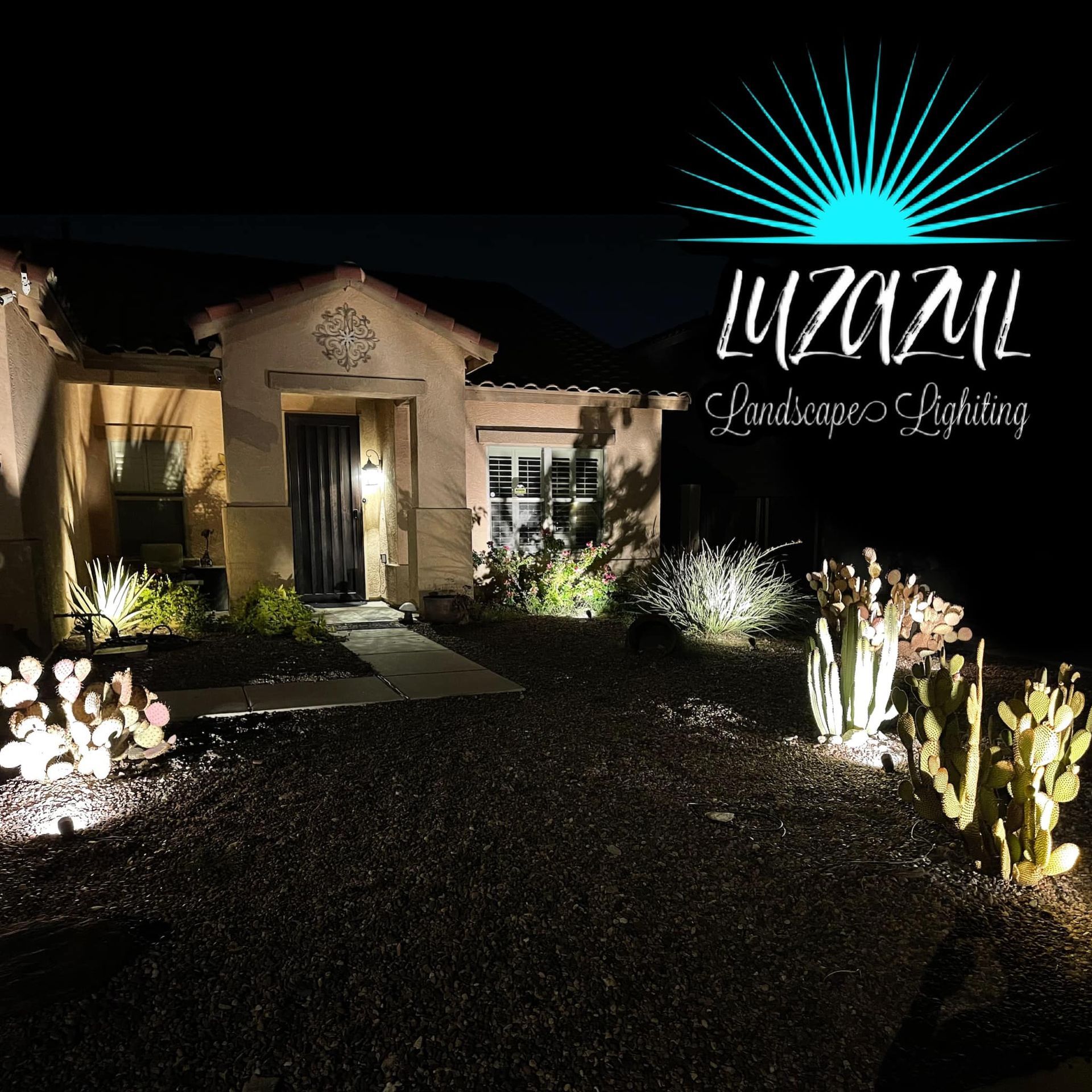 A house with a logo for luzaul landscape lighting