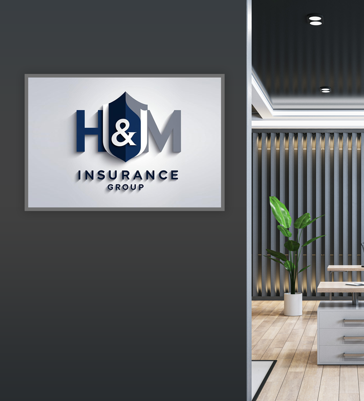 Logo of H&M Insurance Group on a wall, with an office interior visible in the background.