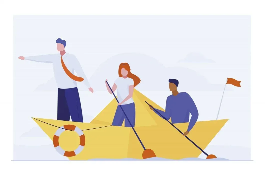 A group of people are rowing a yellow paper boat.