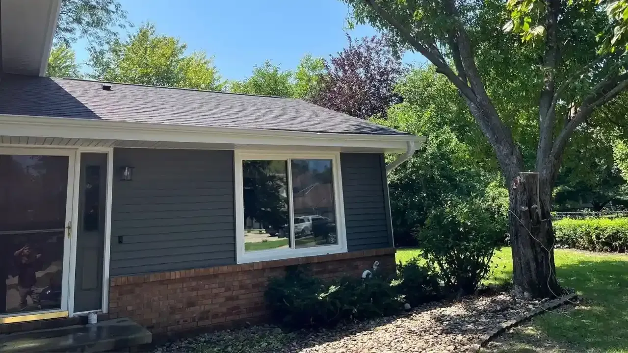 After storm-damaged tree removal from house in Des Moines, Iowa