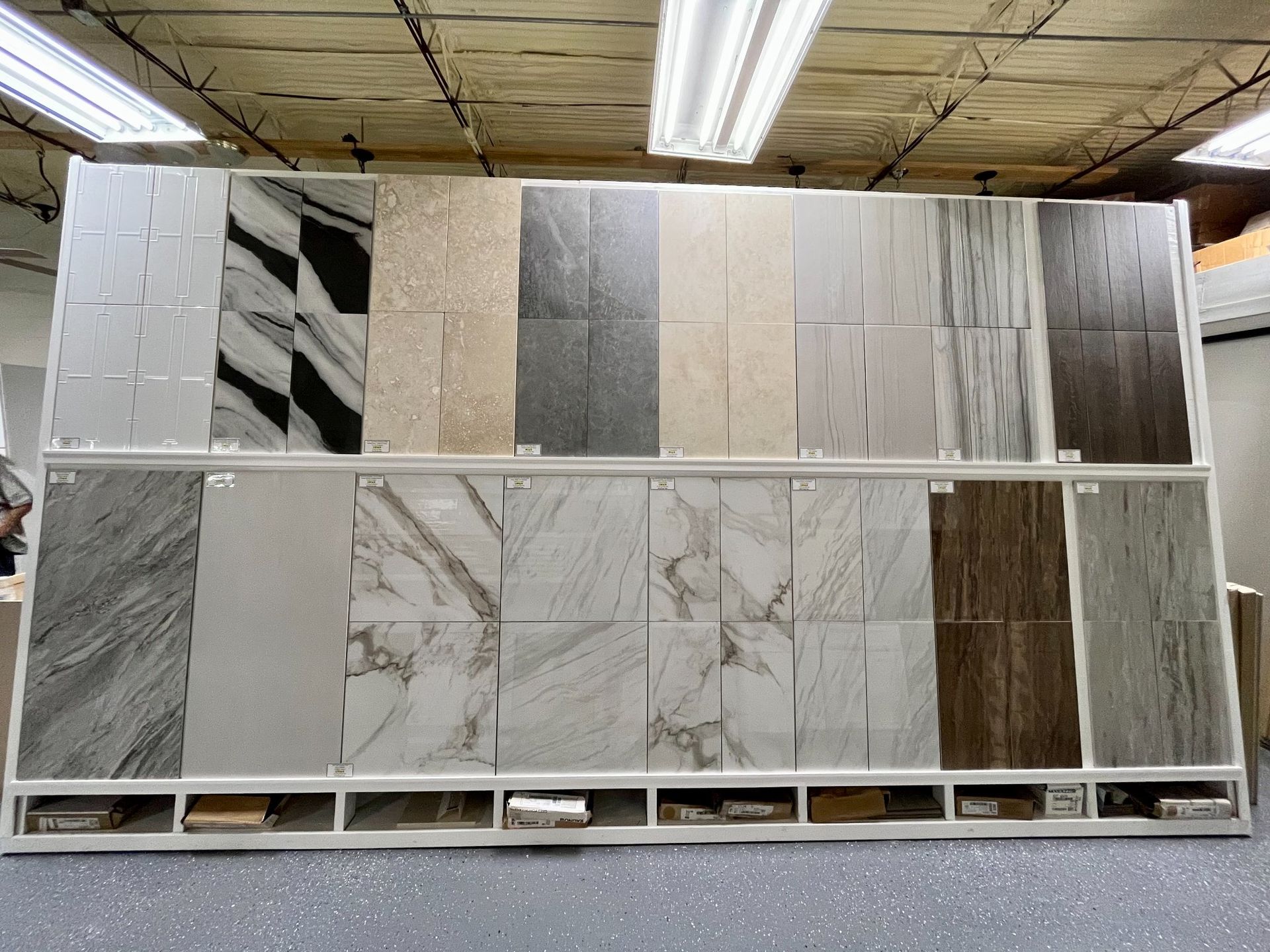 There are many different types of tiles on display in this store.