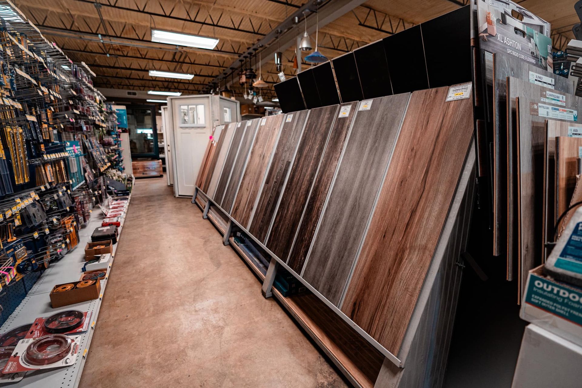 There are many different types of tiles on display in this store.