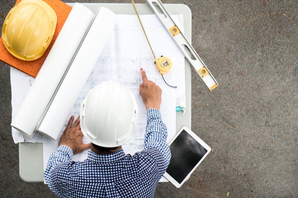 Engineer Working On Site — Commercial Drafting in Forster, NSW