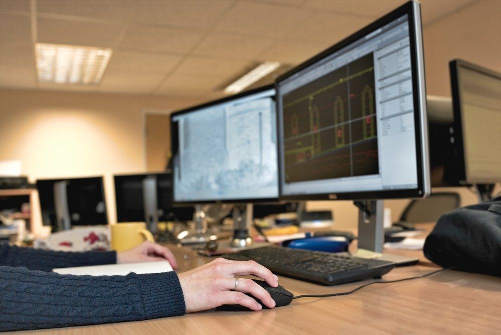 Surveyor On A Computer — Residential & Commercial Drafting in Forster, NSW