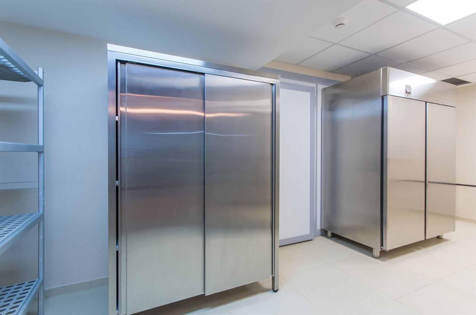 Fridge and Shelves in a Professional Kitchen — Air Conditioning & Refrigeration Services in Coffs Harbour, NSW
