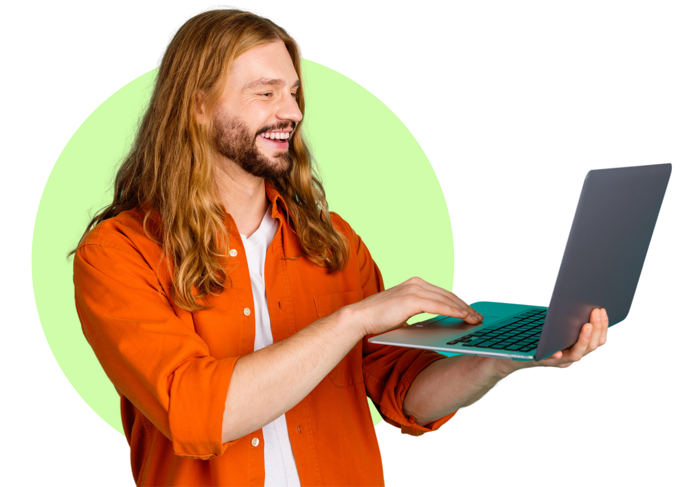 A man with long hair is using a laptop computer.