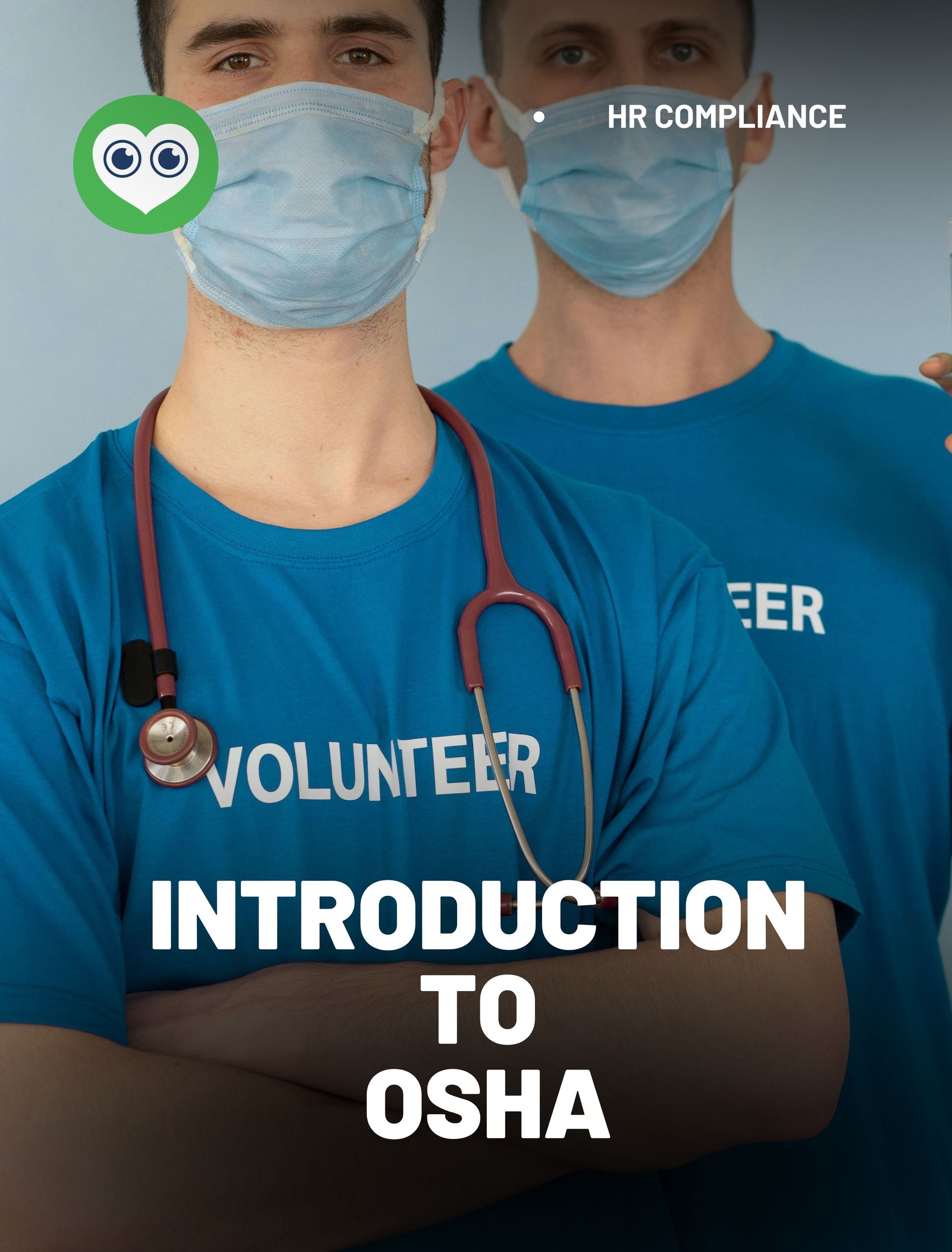 Two men wearing masks and volunteer shirts are standing next to each other