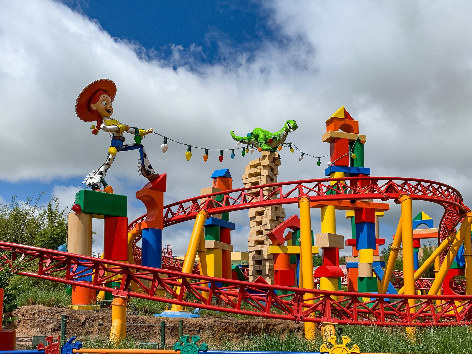 A roller coaster with a toy story character on it.