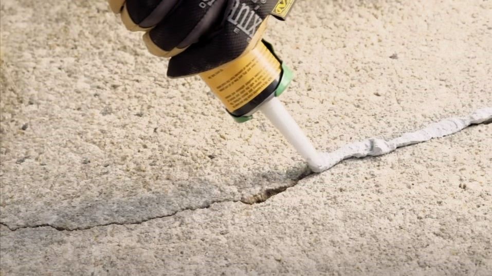 Repairing cracks in concrete using a  crack filler