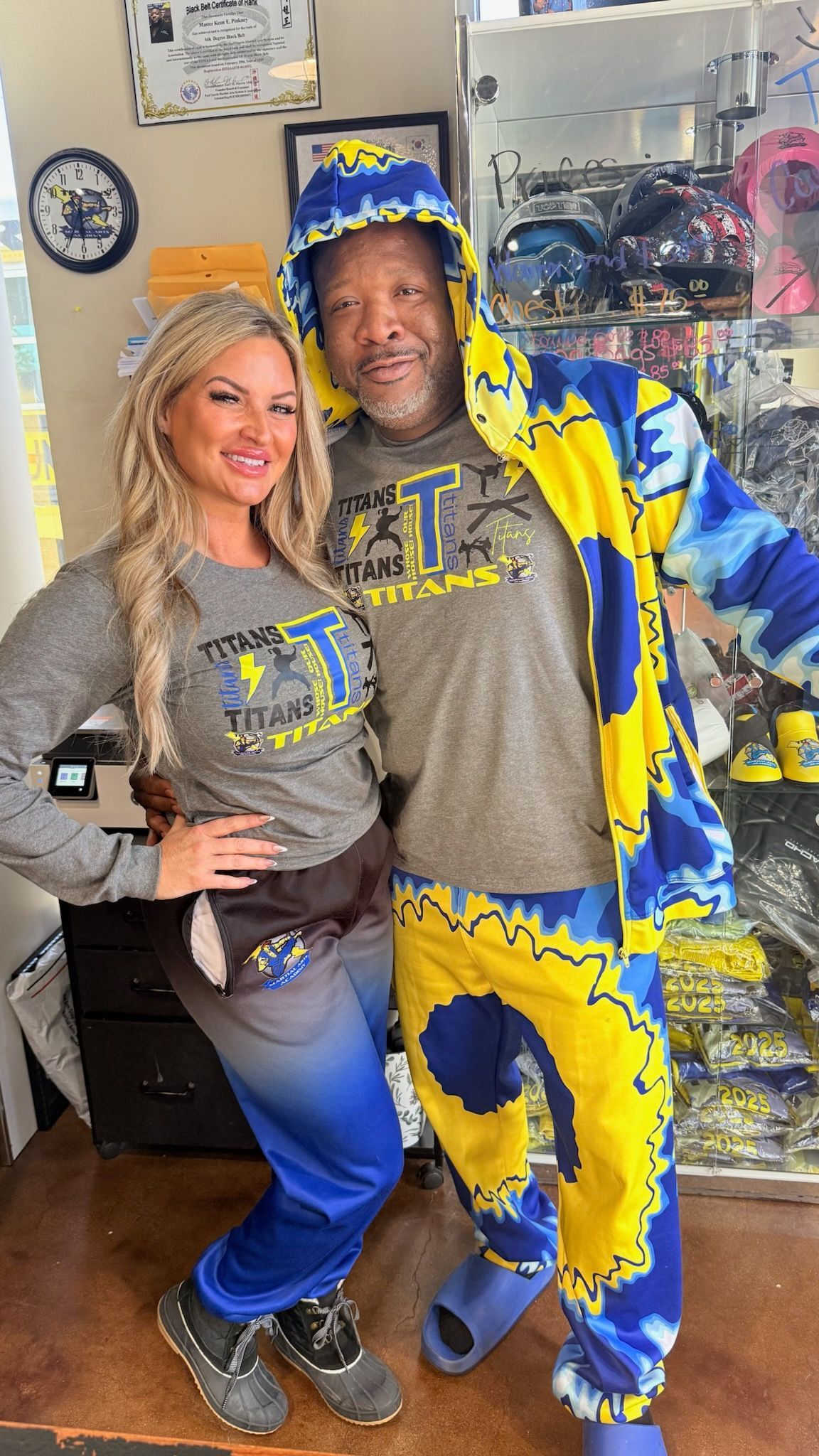 A group of people in karate uniforms are posing for a picture.