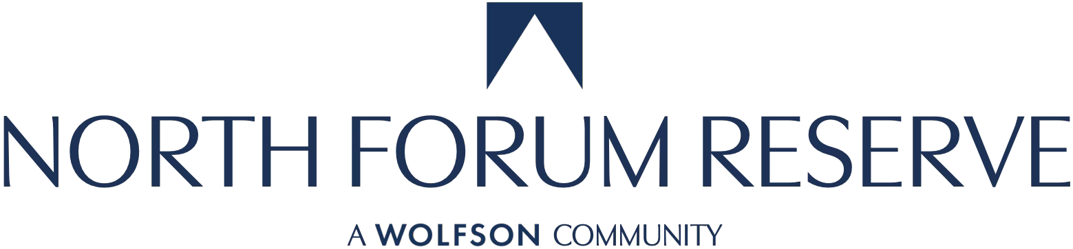 Logo for North Forum Reserve, a Wolfson Community, with a blue geometric design above the text.