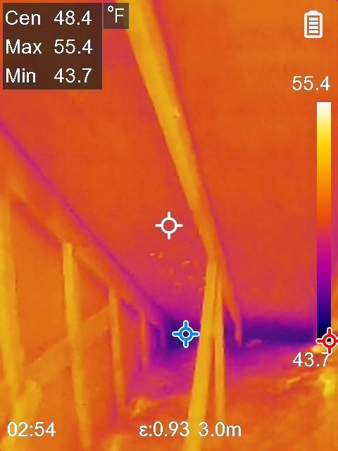 thermal imagery of a roof from inside the attic. Insulation baffles are properly allowing air into the soffit.