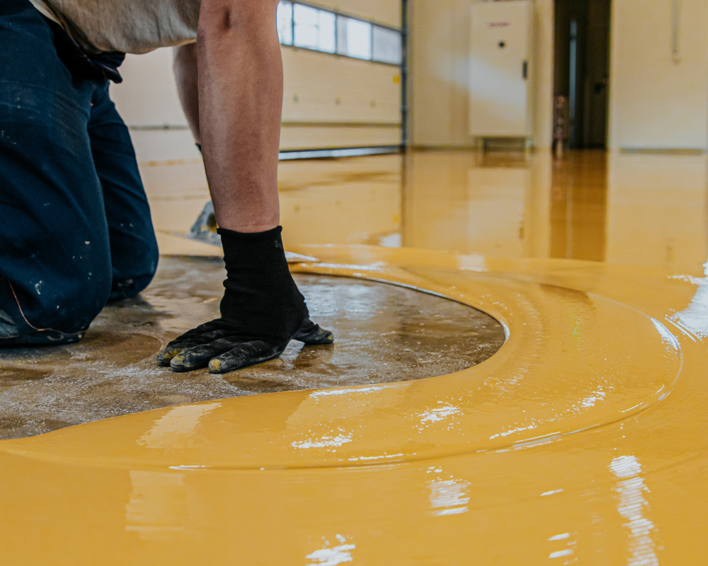 backyard path made up of concrete sidewalk sqaures going through the grass