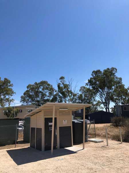A public toilet is sitting in the middle of a dirt field | Murray Bridge, SA | Ridleys, SA