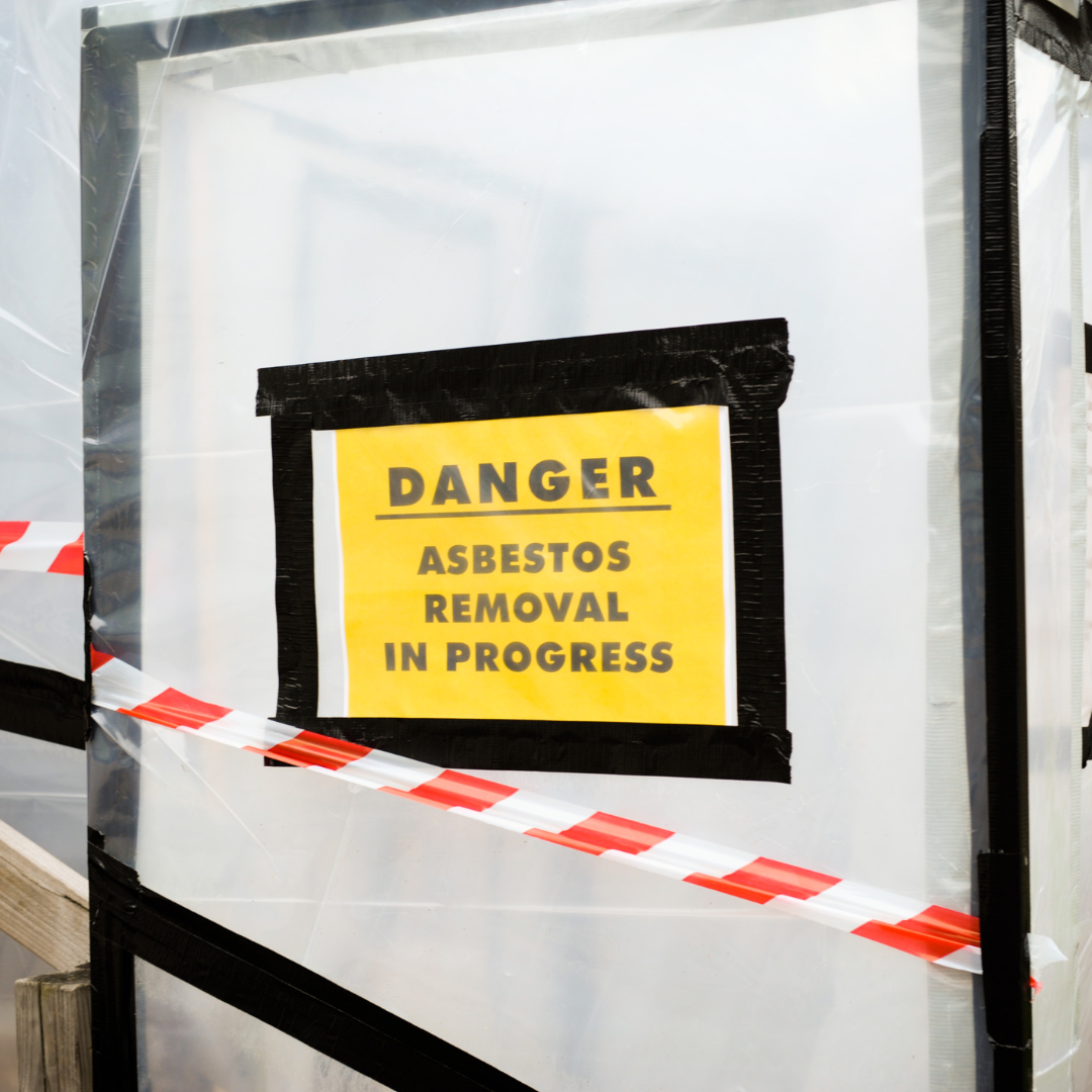 A sign that says danger asbestos removal in progress