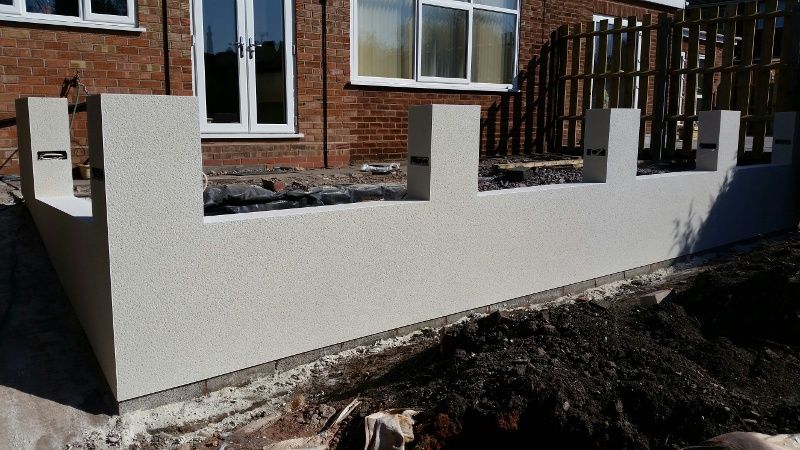 after - rendered terrace wall - garden view
