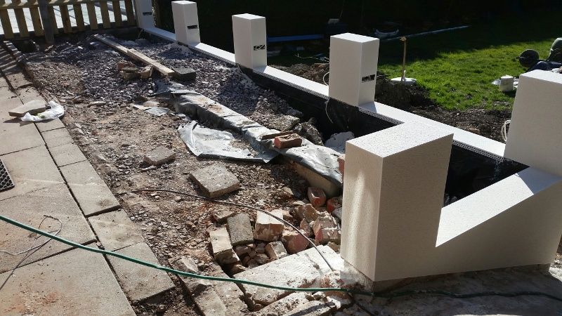 after - rendered garden terrace walls - house view