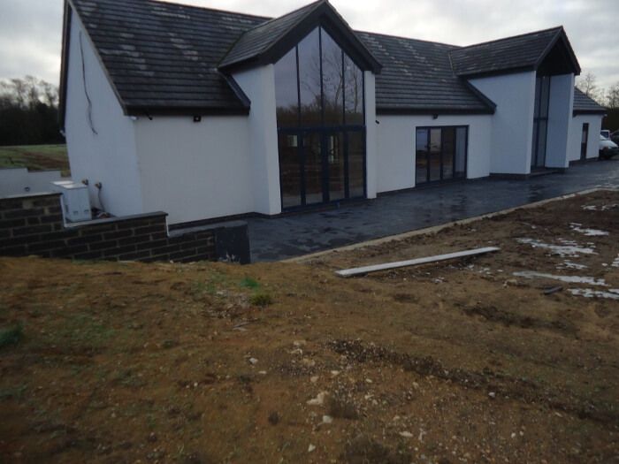 after - rendered house - front side view