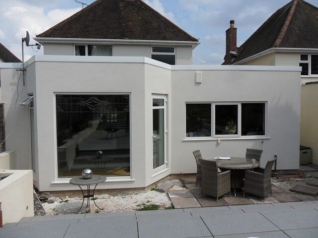 after - rendered house - backyard view