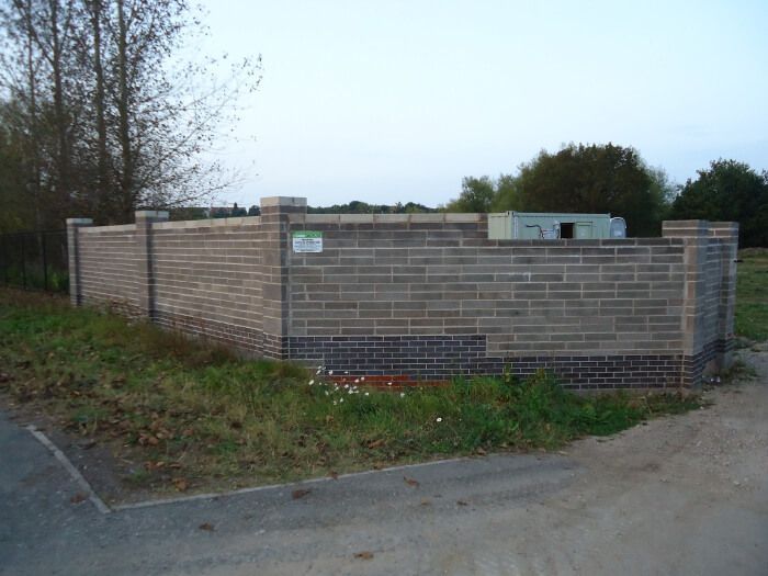 before - outer brick wall - side view