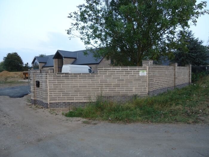 before - outer brick wall