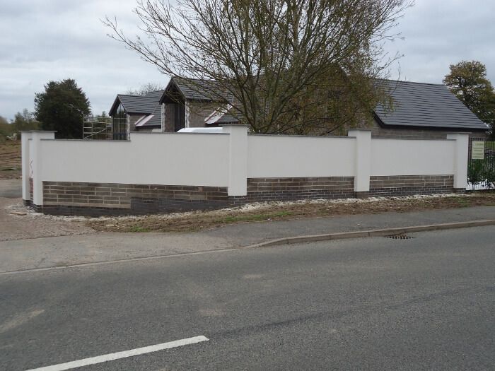 after - rendered brick wall