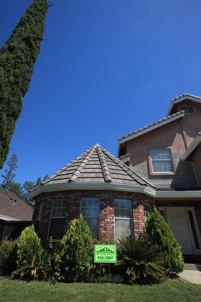 Emergency Roofing Installation — Small House Far View in Sacramento, CA