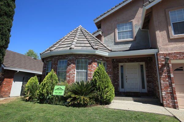 Tile Roofing Information — Two Storey Hear View in Sacramento, CA