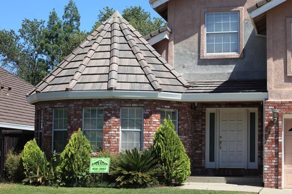 Residential Roofing Maintenance — Two Storey Brown Roofing Front View in Sacramento, CA