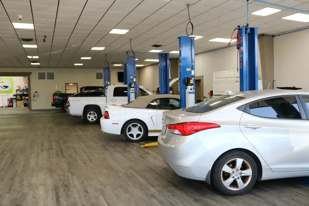 Vehicles Parked Inside of Shop | Pensacola AC & Auto Service Center