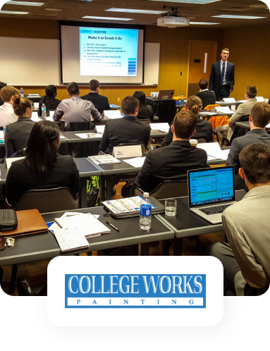 a group of people are sitting in a classroom with a college works logo on the bottom
