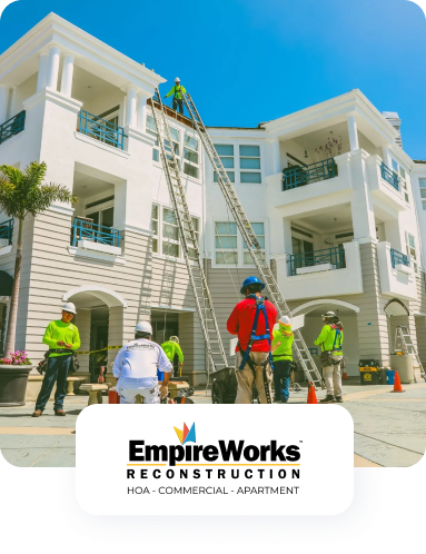 a group of construction workers are working on a building .