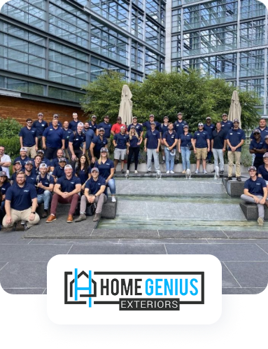 a group of people are posing for a picture in front of a building .