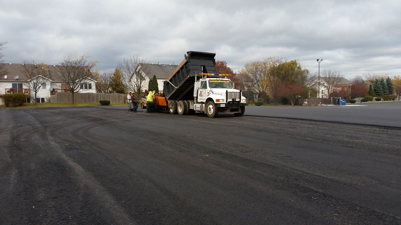 Unloading Truck | Elgin, IL | RG Asphalt & Concrete LLC
