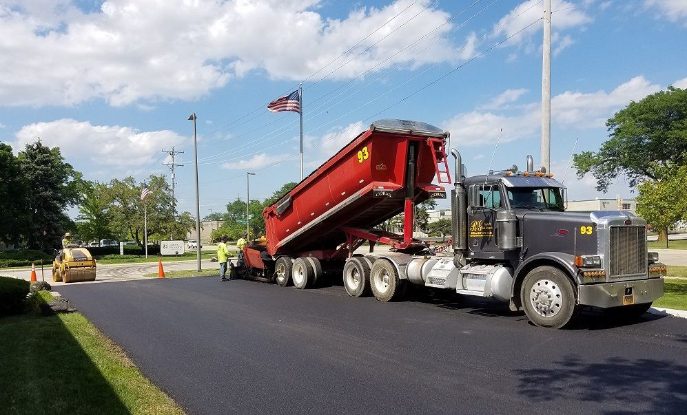 Service Truck In Operation | Elgin, IL | RG Asphalt & Concrete LLC