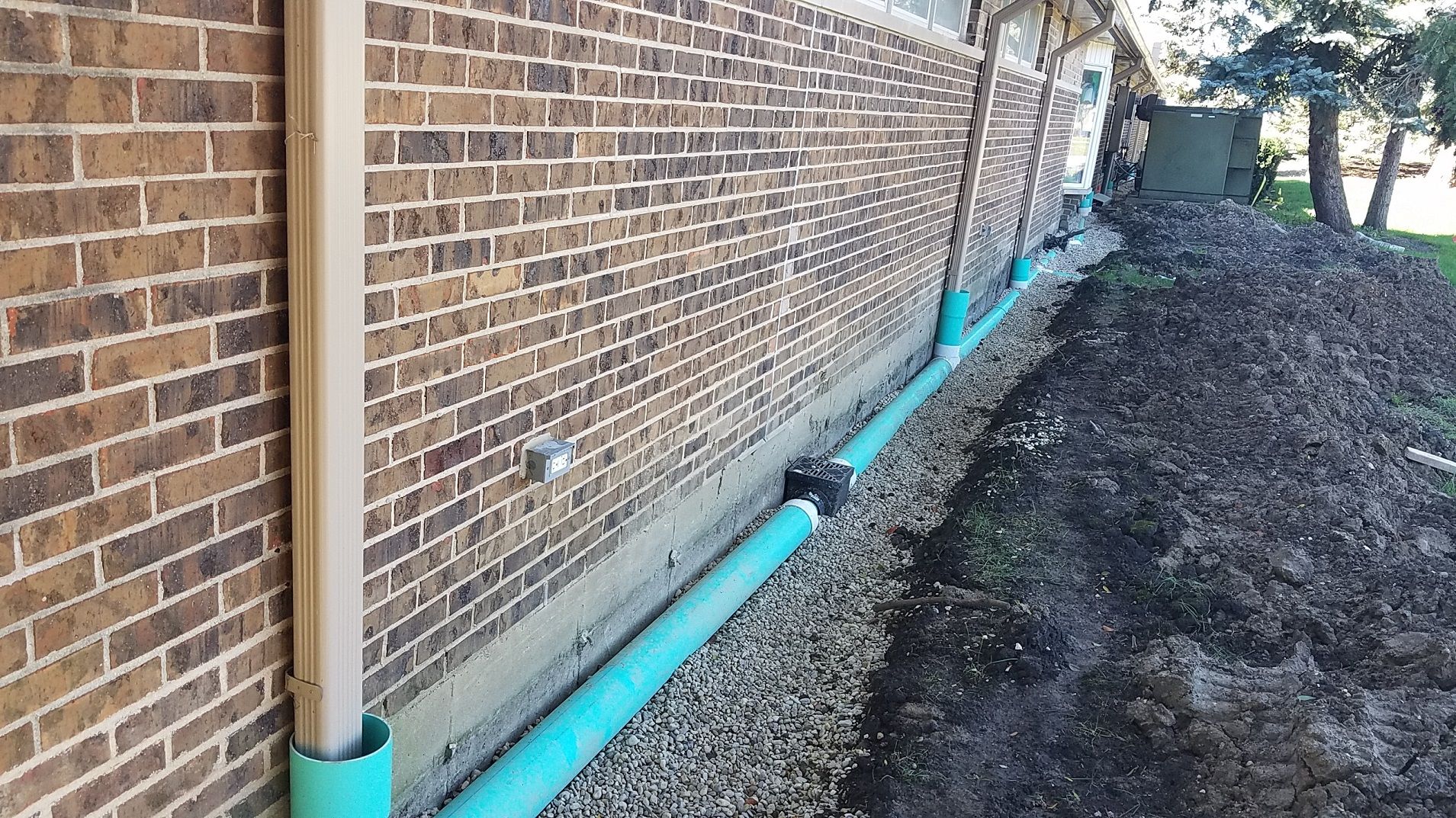 Drain Installation Almost Done | Elgin, IL | RG Asphalt & Concrete LLC