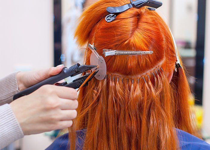 Hair Styling Blog — Hairdresser Doing Hair Extensions to a Girl in Scottsdale, AZ