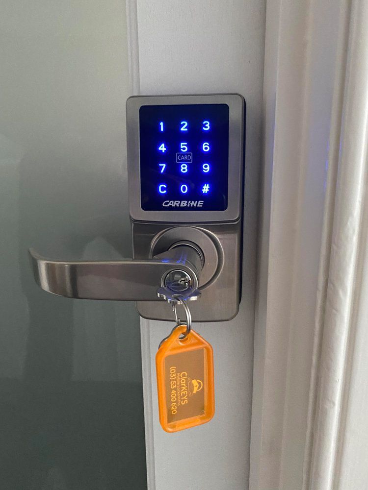 A Door With A Keypad And A Key On It — ClarKEYS Mobile Locksmiths In Winter Valley, VIC