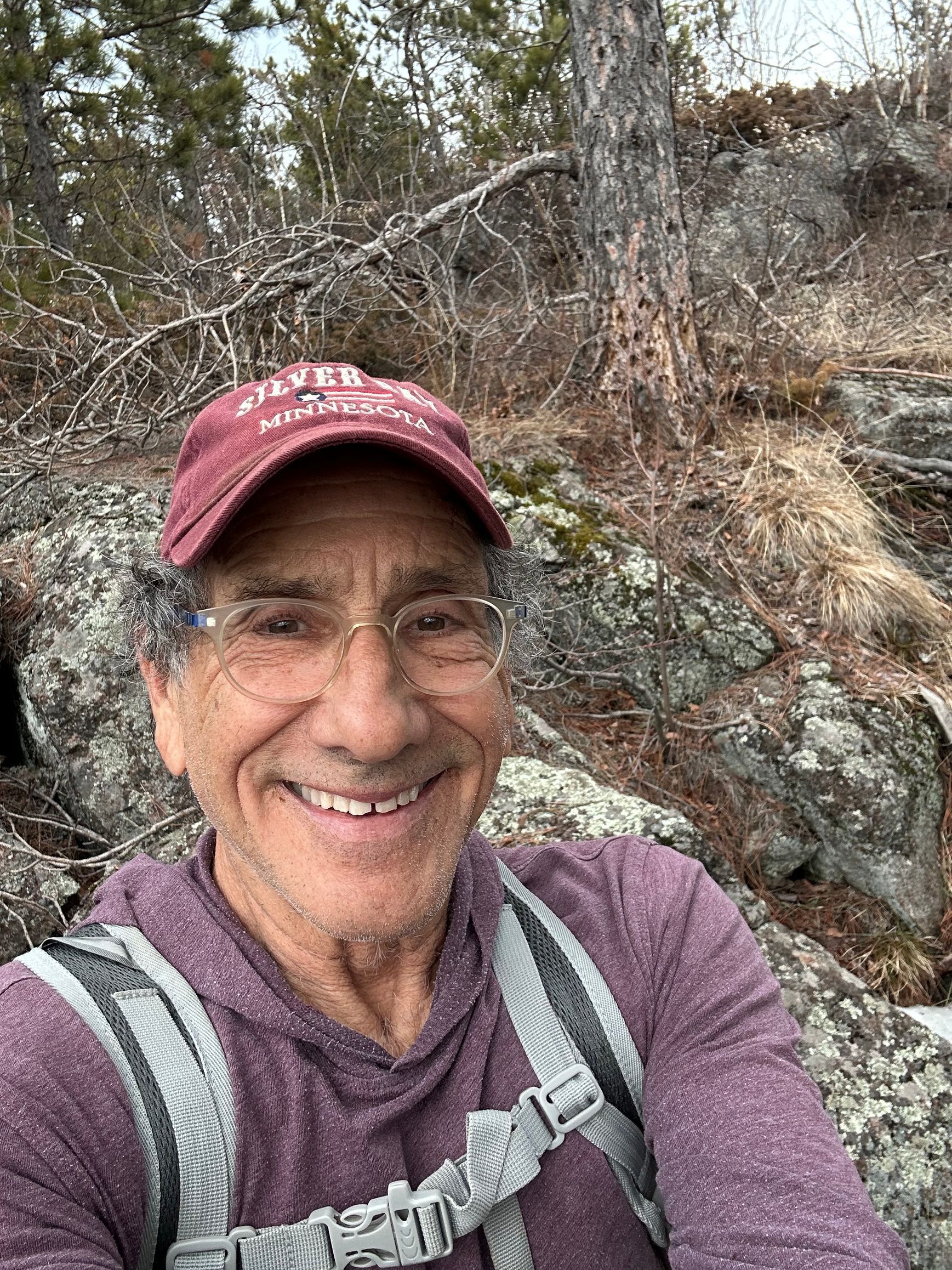 Gray silhouette of a person in a light gray circle.