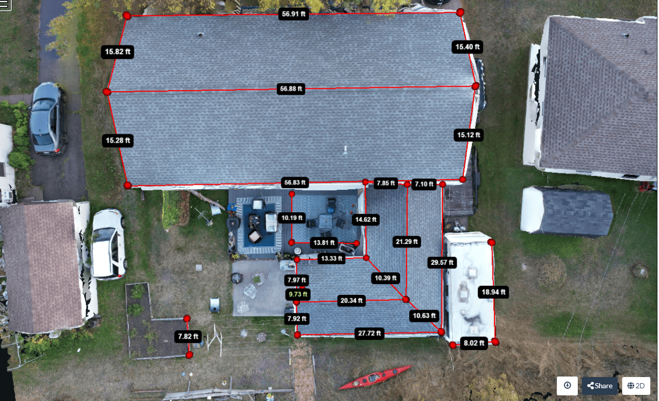 Overhead view of a house with a gray roof, red lines outlining edges, and labels. Two cars and a canoe are also visible.