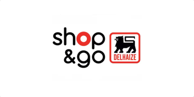 Het logo voor shop & go delhaize met een leeuw erop.
