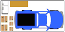 Top-down view of a blue car parked inside a garage. There are boxes and a refrigerator to the left and a storage shelf at the top.