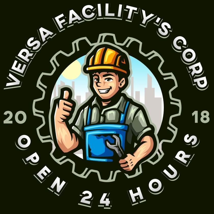 A man in a hard hat is holding a wrench and giving a thumbs up.