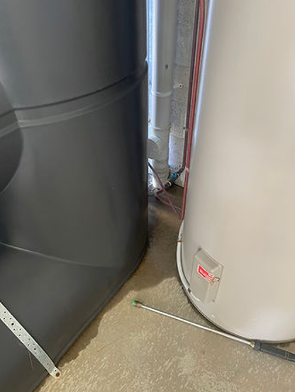 Two Cylindrical Tanks, One Gray — NatureWise Pest Control In Port Macquarie, NSW